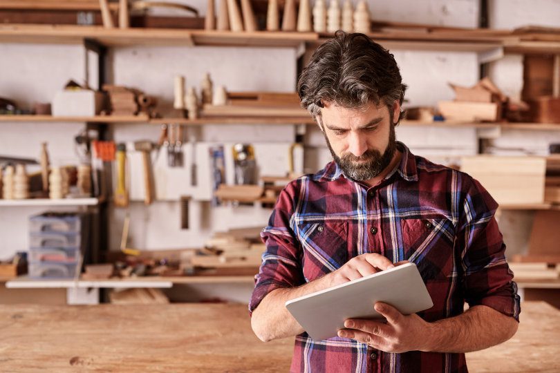 Craftman using a tablet PC