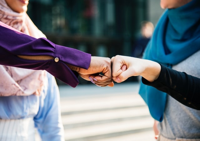 Fist Bump Represents Effective Email Autoresponder